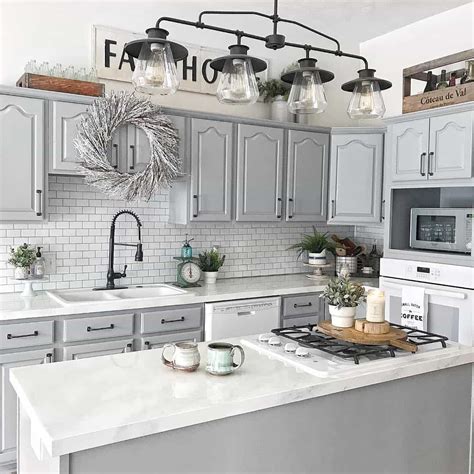 grey cabinets with stainless steel farmhouse sink|farmhouse kitchen with gray cabinets.